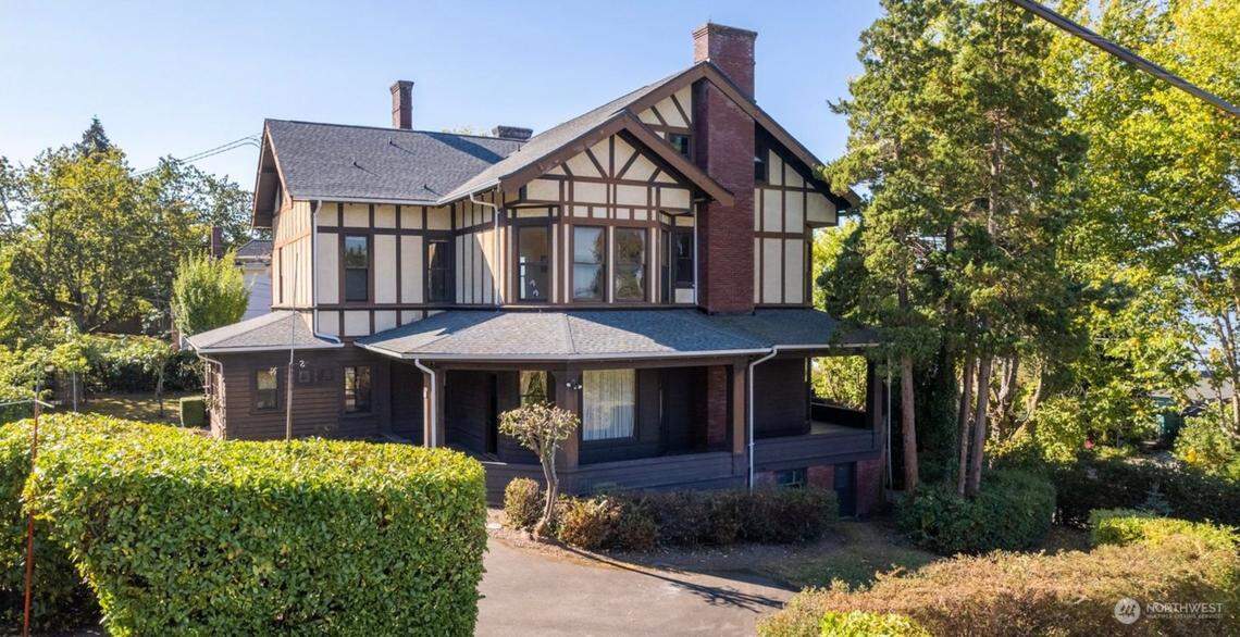 The Clark Mansion property as it is listed for sale in Bellingham. The now Tudor-style home stands three stories tall after its remodel in 1919.