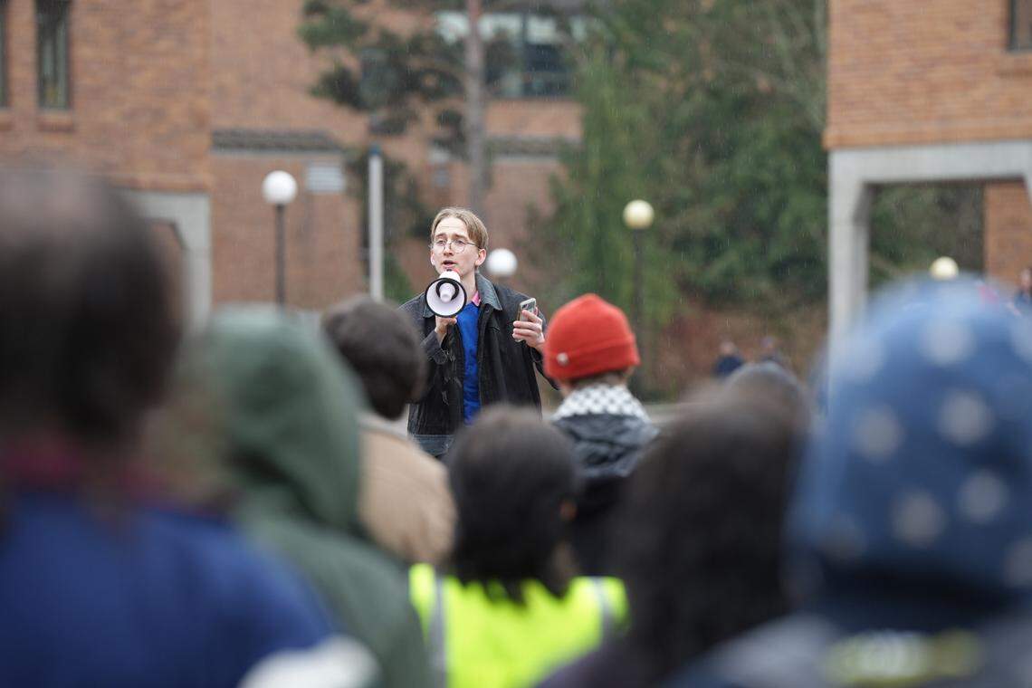 Ian Schaefer Lorenz, a student employee at Western Washington University, spoke to a crowd of more than 100 students and staff.