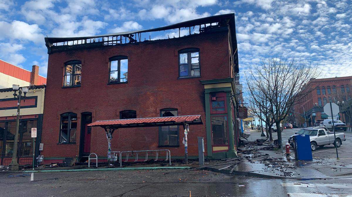 Debris from the fire is scattered through Harris Avenue and 11th Street.