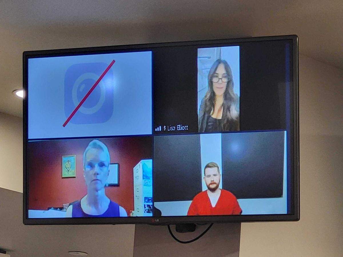Fired Whatcom County Sheriff’s deputy Austin Michael Case (bottom right) makes his first appearance Thursday, July 13, in Whatcom County Superior Court.