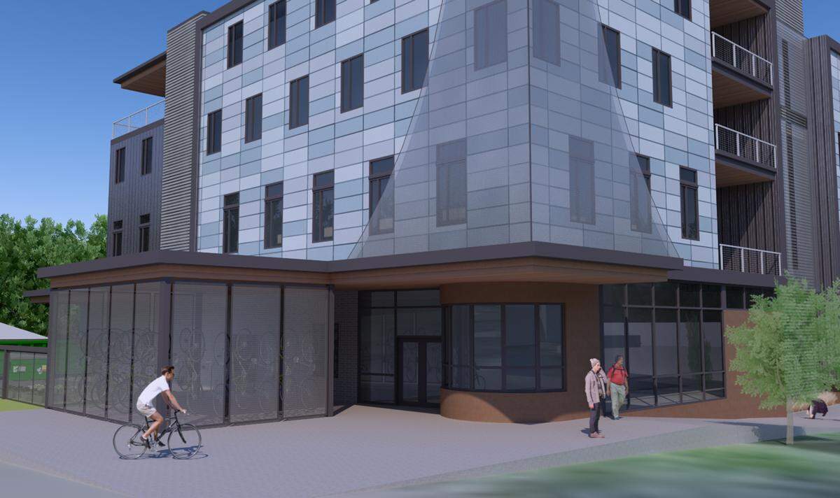 A rendering shows the entrance and bike storage at the new Lighthouse Mission Ministries building that is expected to be completed in 2024 in Bellingham.