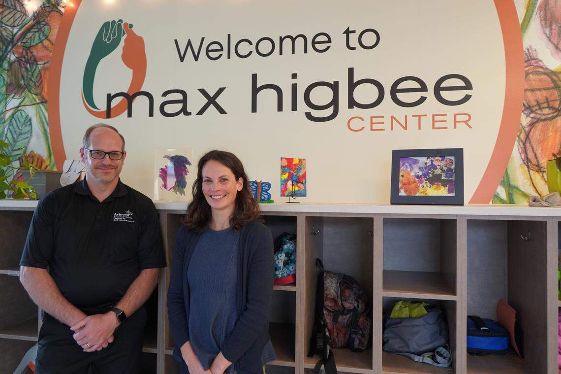 Astound’s Regional Manager Chris Fitzgerald, left, stands with Max Higbee Center Executive Director Kait Whiteside in Max Higbee Center’s entrance area on Thursday, Sept. 15, 2022, in Bellingham, Wash.