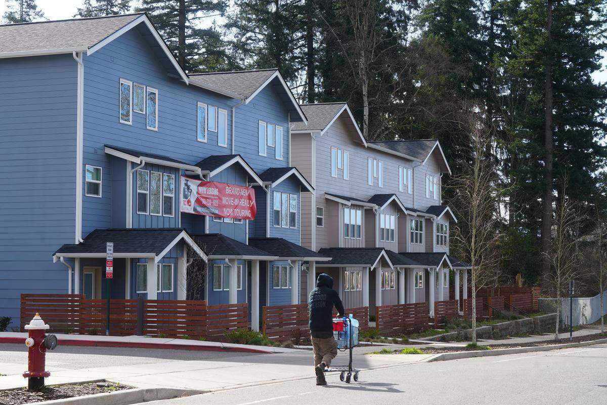 Newly built rental townhomes on Tull Road in Bellingham, Wash. The developers say they are having a hard time filling the units due to the encampment activity in the neighborhood.