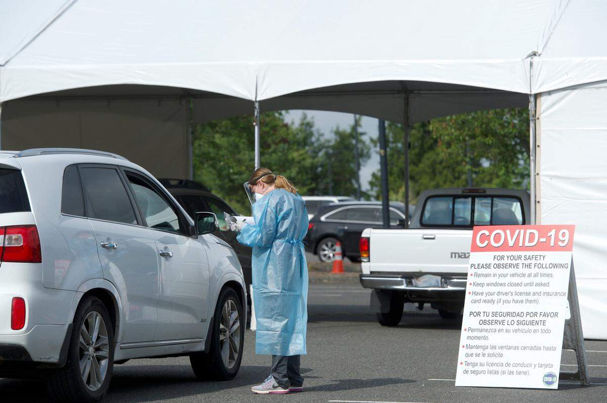 Cars line up for COVID-19 testing Friday, July 10, at Civic Athletic Complex in Bellingham. Whatcom County has now announced it will offer mobile testing for COVID-19 starting Monday, Aug. 10, as part of ongoing efforts to bring low-barrier testing to residents throughout the county.