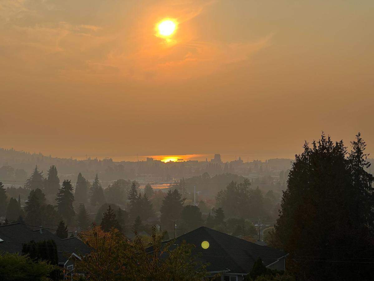 A smoky haze was visible over downtown Bellingham on Friday evening, Oct. 14, from the Alabama Street footbridge.