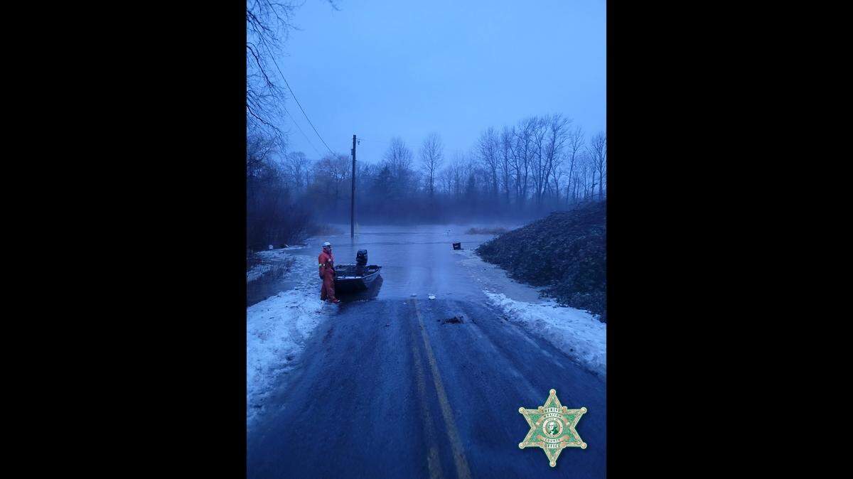 Six people and five dogs were evacuated Sunday, Dec. 25, from Marietta north of Bellingham after homes along Marine Drive flooded due to a combination of ice building up at the mouth of the Nooksack River and King Tides.