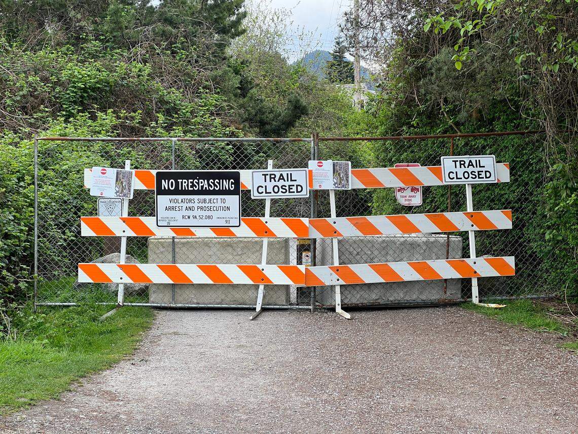 A part of the South Bay Trail between Taylor Dock and downtown Fairhaven is closed during construction of apartments, commerical space and a parking garage at 11th Street and Mill Avenue, which was formerly a dirt parking lot called “the Pit.”