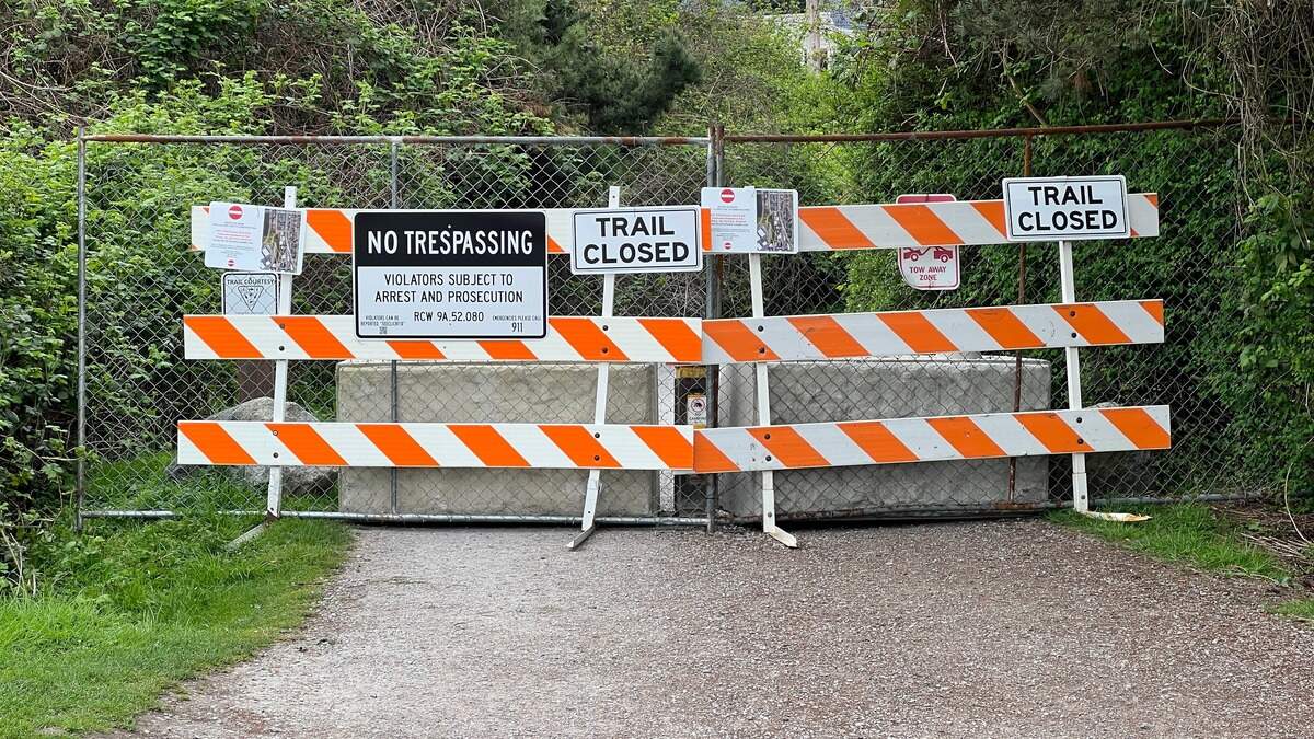 A section of the South Bay Trail between Taylor Dock and downtown Fairhaven is closed during construction of apartments, commercial space and a parking garage at 11th Street and Mill Avenue, which was formerly a dirt parking lot known as “the Pit.”