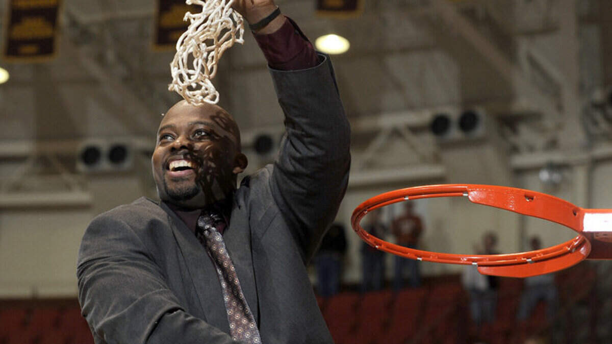 Midwestern State’s head coach Nelson Haggerty celebrates the Mustangs’ 77-61 win over Arkansas Tech in the NCAA Division II South Central men’s regional basketball championship finals, Tuesday, March 13, 2012.