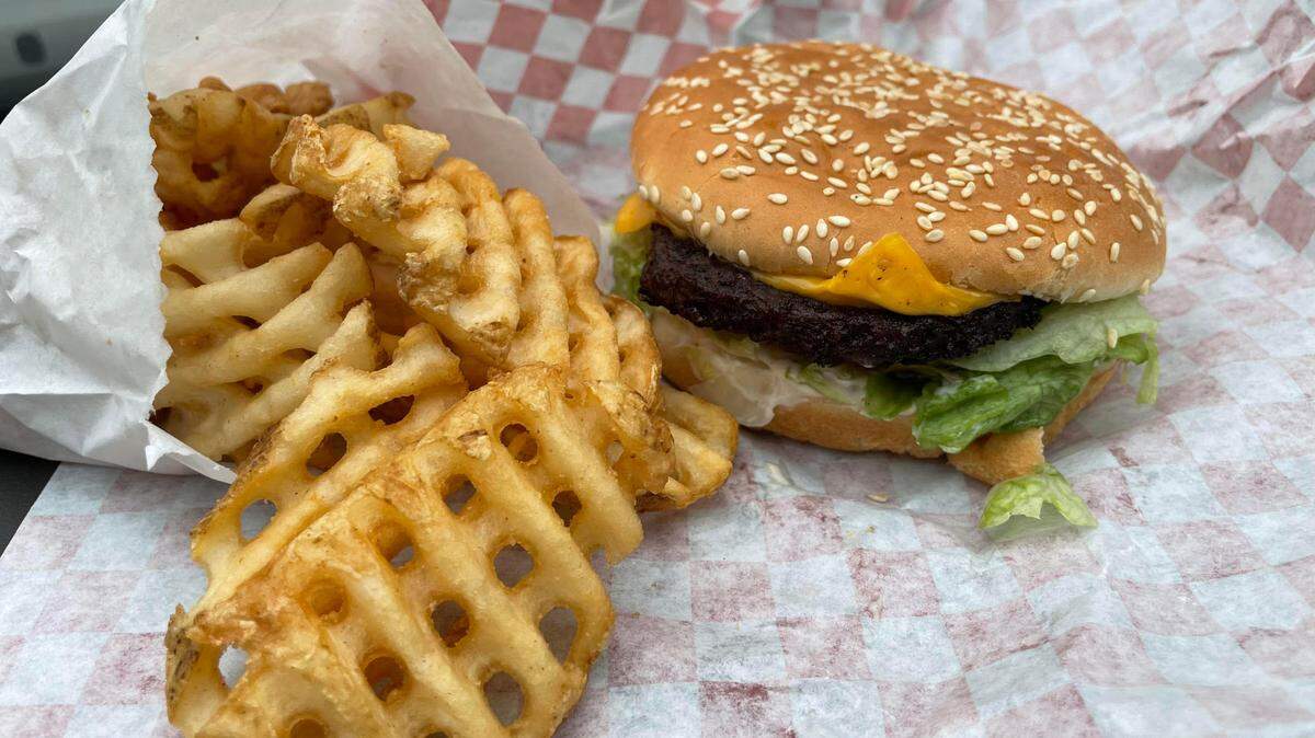 A Boomer burger and waffle fries from Boomers Drive-In on Friday, Jan. 6, .in Bellingham.