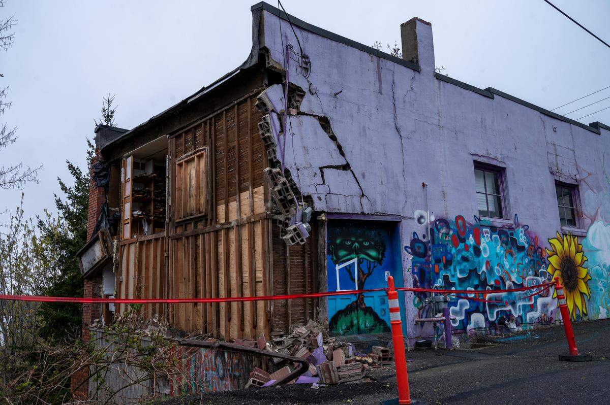 Damage to Fourth Corner Frames remains Tuesday, April 5, in Bellingham. The business on West Holly Street was damaged following a powerful windstorm on Sunday night, April 3.