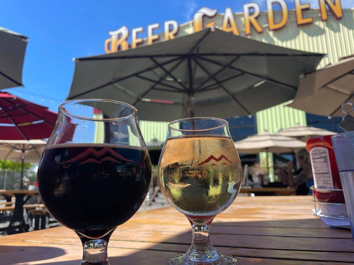 Twin Sisters Brewing Company’s Lullaby Imperial Stout and rotating hard cider at the brewery’s outdoor beer garden in Bellingham, Wash. on Aug. 4, 2023.