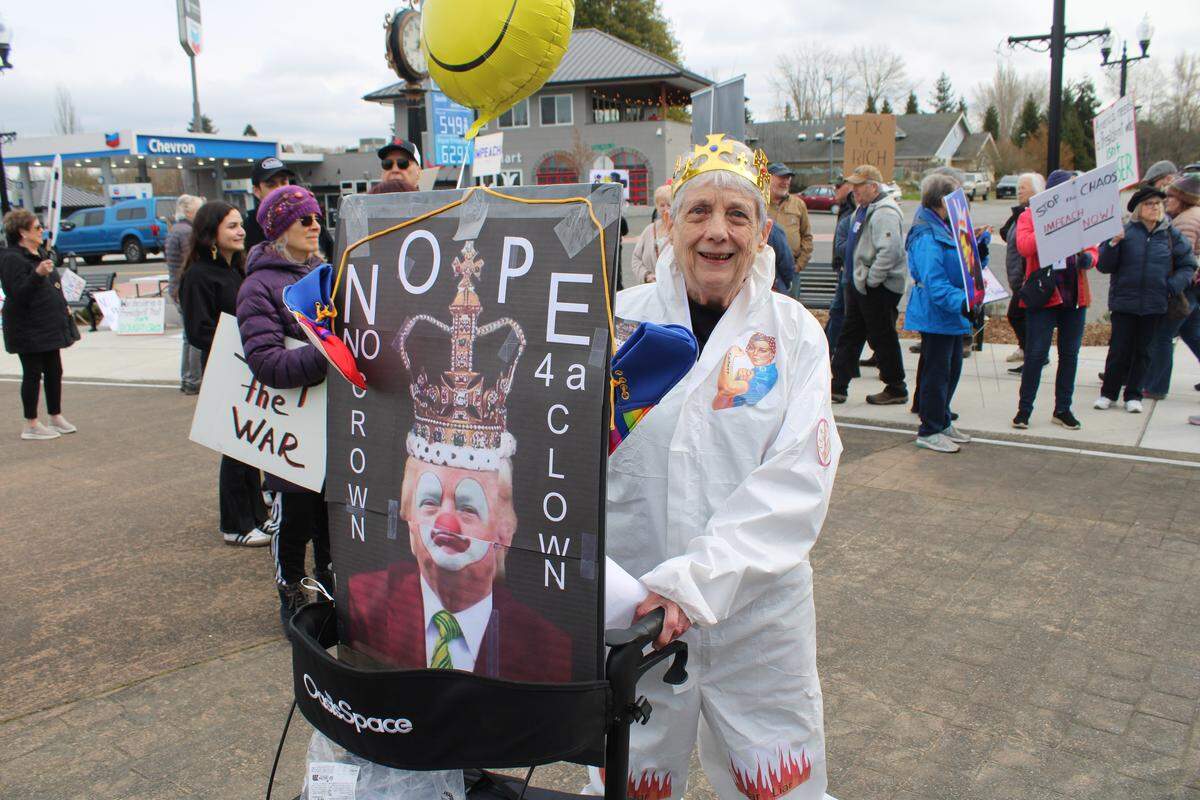 Debbie Browning displays her handmade sign and outfit at the Blaine ‘No Kings’ protest. The nationwide day of action is in opposition of the Trump administration and its actions.