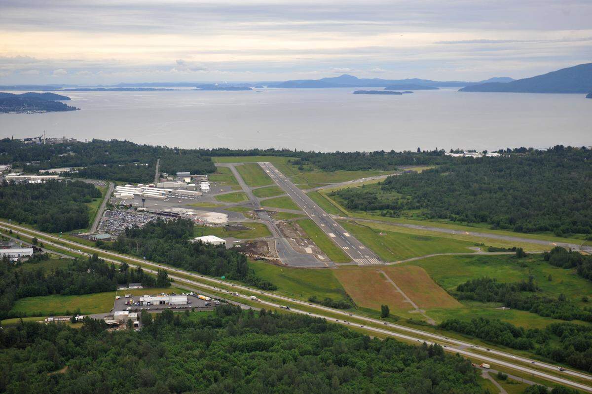 Bellingham International Airport with Bellingham Bay in the background, taken in 2010 from a Northwest Sky Ferry flight to San Juan Island.