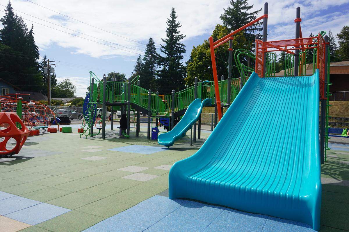 The slides at the new inclusive playground at Silver Beach Elementary School have wider bases at the bottom to support a safer landing. The new playground was completed on Aug. 28. 2023, in Bellingham, Wash.