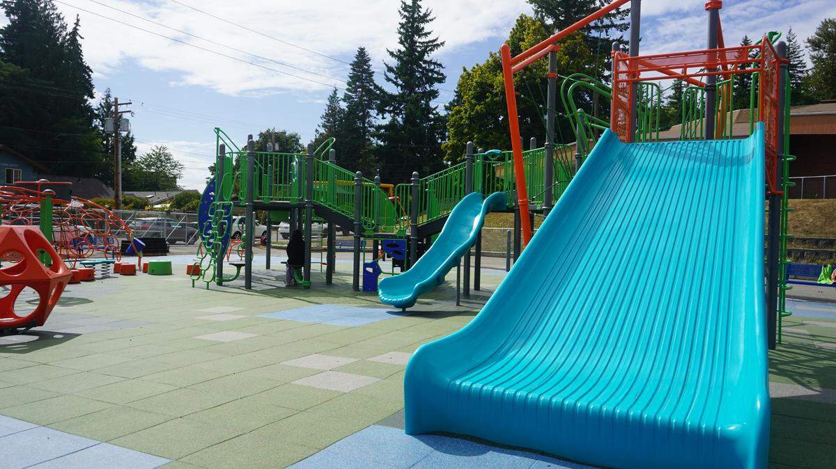 The slides at the new inclusive playground at Silver Beach Elementary School have wider bases at the bottom to support a safer landing. The new playground was completed on Aug. 28. 2023, in Bellingham, Wash.