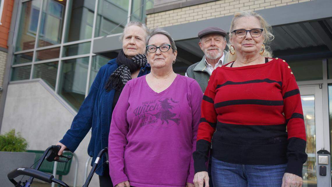Eleanor Apartments tenants Karina Davidson, left, Denise Powell, Stan Betts and Patty Dawn, on Tuesday, April 11, said they are concerned about being priced out of the affordable housing complex in Bellingham.