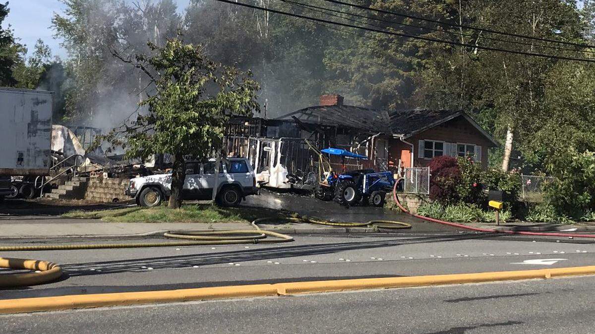 Bellingham Fire Department crews fight a house fire Sunday afternoon, June 20, 2021, in the 1100 block of West Bakerview Road. Firefighters returned to the same address Tuesday, Dec. 14, for a trailer fire behind the house.