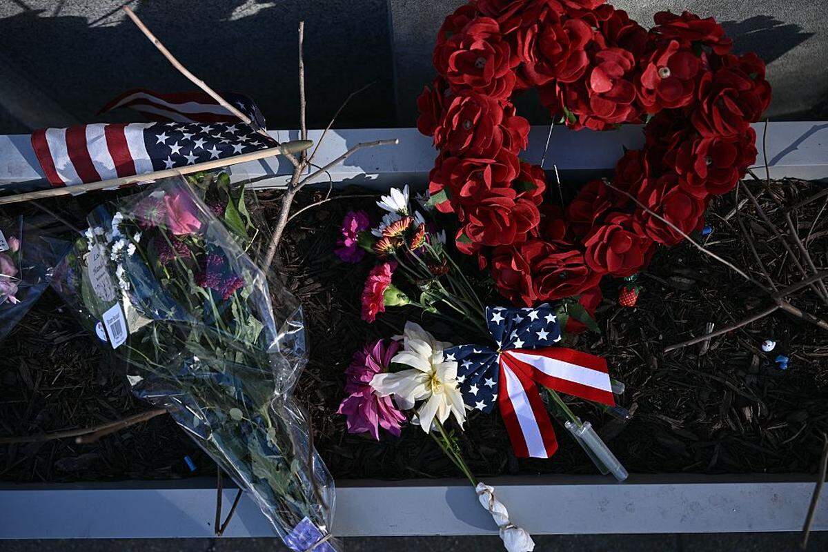 A makeshift memorial has been set up in honor of the two National Guard service members shot near the Farragut West Metro Station in Washington, DC on November 28, 2025, two days after a shooting killed one National Guard member and critically wounded another.