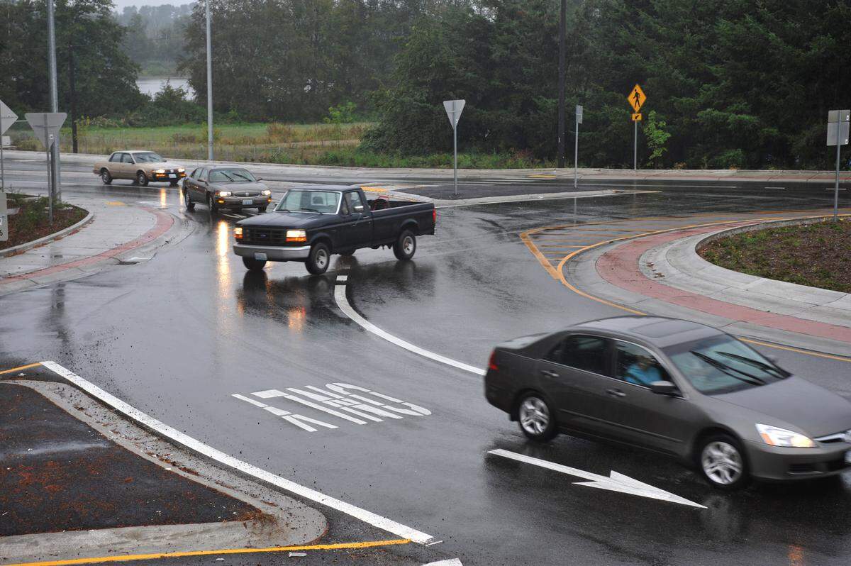 Drivers navigate a roundabout at Guide Meridian and Wiser Lake Road in 2010.