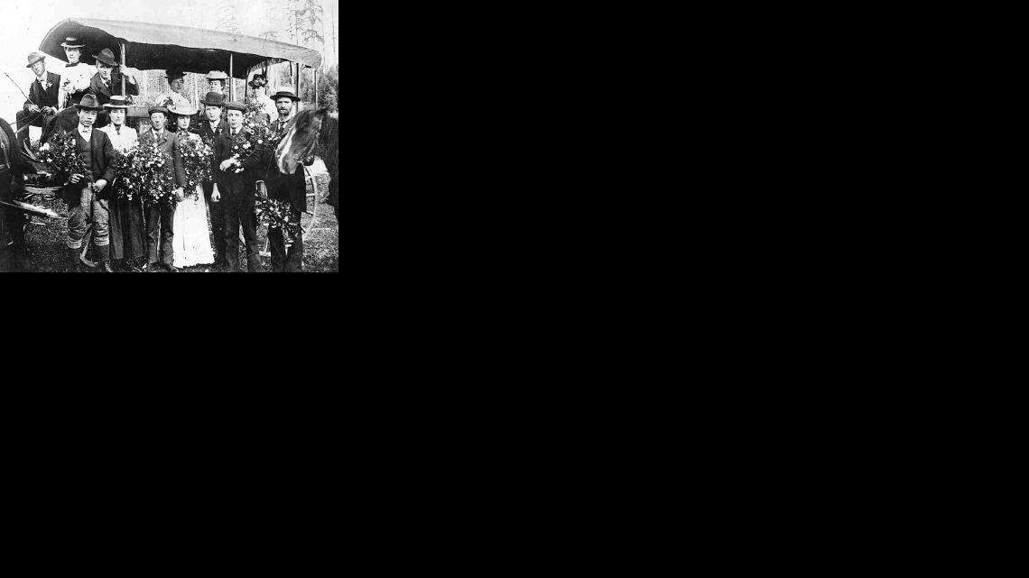 These students and teachers posed to mark the graduating class of 1900 at Fairhaven High School. They are: (in buggy, from left), Jack Slattery, Myra Hanspeter, Robert Hopkins and teachers Miss Carrie Bachtel, Miss Emma Roll and Mrs. Hughes; (front row, from left), Henry Makino, Grace Auld, Lavelle German, Gertrude Anderson, Gene Hoskins, William German and professor W.J. Hughes.