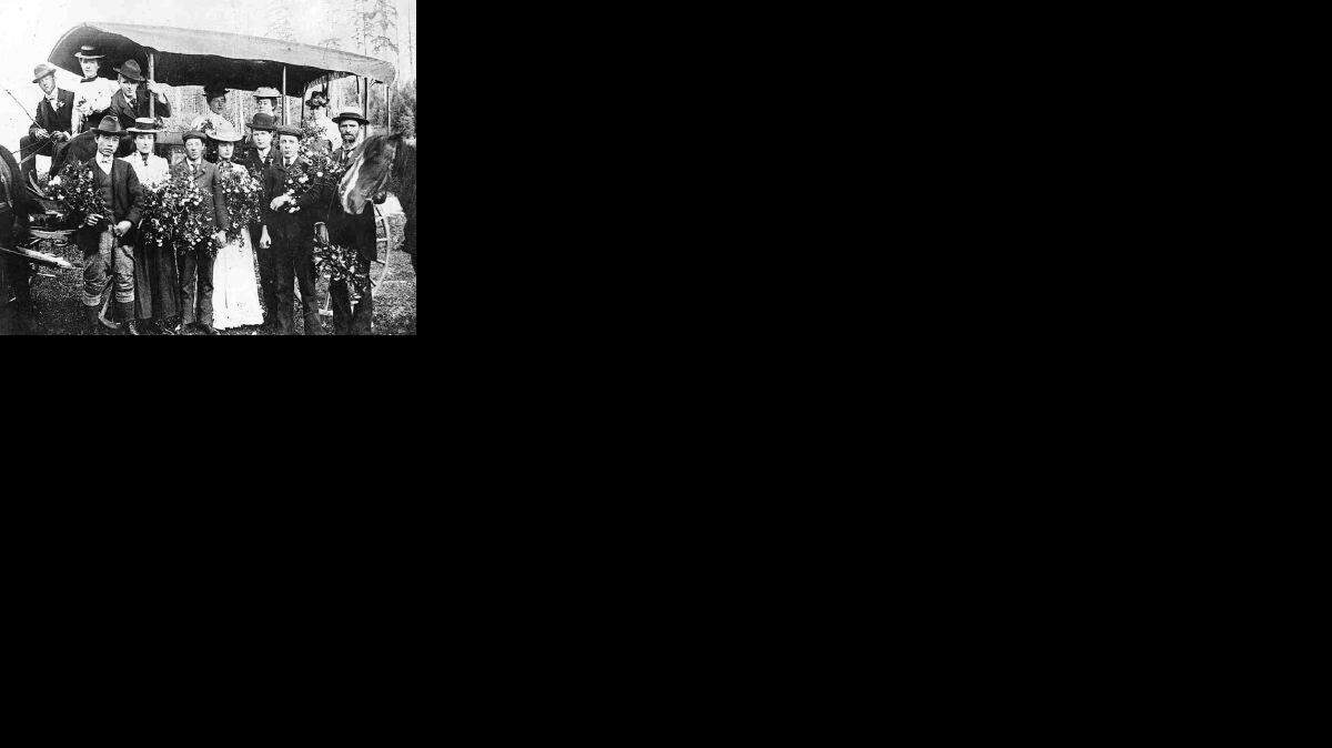 These students and teachers posed to mark the graduating class of 1900 at Fairhaven High School. They are: (in buggy, from left), Jack Slattery, Myra Hanspeter, Robert Hopkins and teachers Miss Carrie Bachtel, Miss Emma Roll and Mrs. Hughes; (front row, from left), Henry Makino, Grace Auld, Lavelle German, Gertrude Anderson, Gene Hoskins, William German and professor W.J. Hughes.