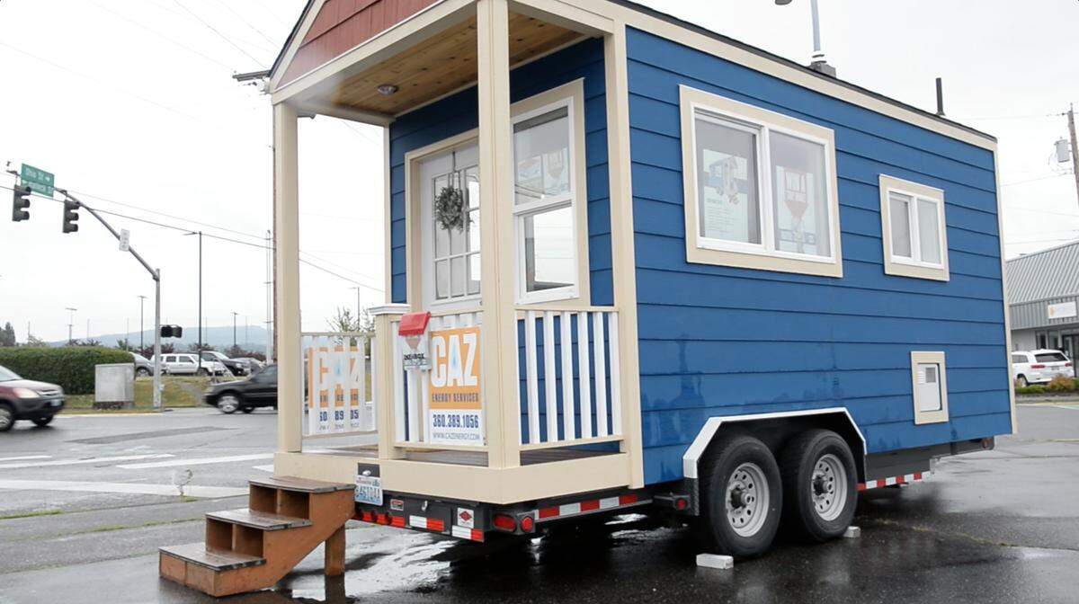 A tiny house built by CAZ Energy Services waits at Halleck Street and Cornwall Avenue to be raffled off by Kulshan Community Land Trust Sept. 22.