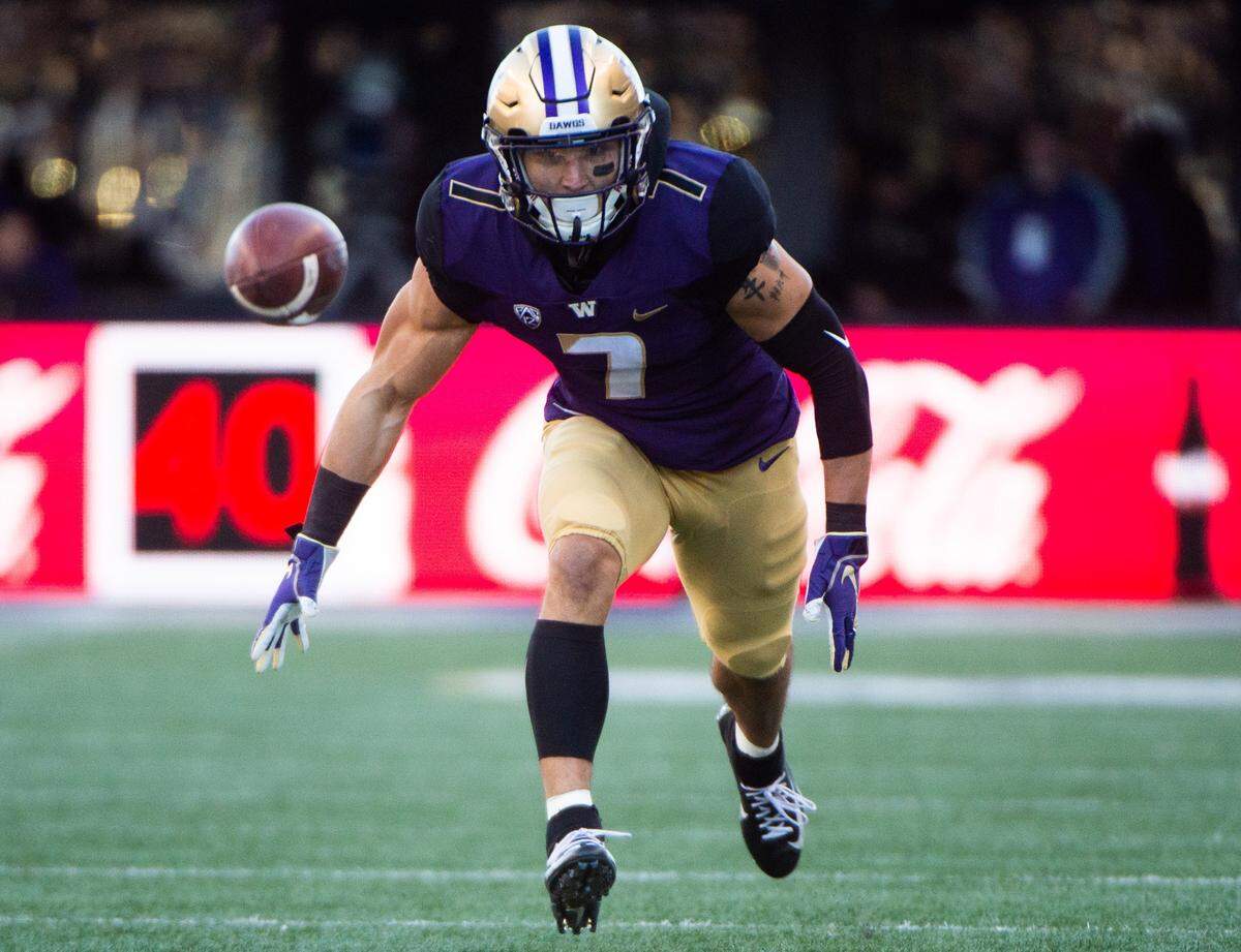Washington defensive back Taylor Rapp tracks a ball against Oregon State in a Nov. 17, 2018, game at Husky Stadium in Seattle. Rapp is expected to be taken early in the 2019 NFL Draft this weekend.