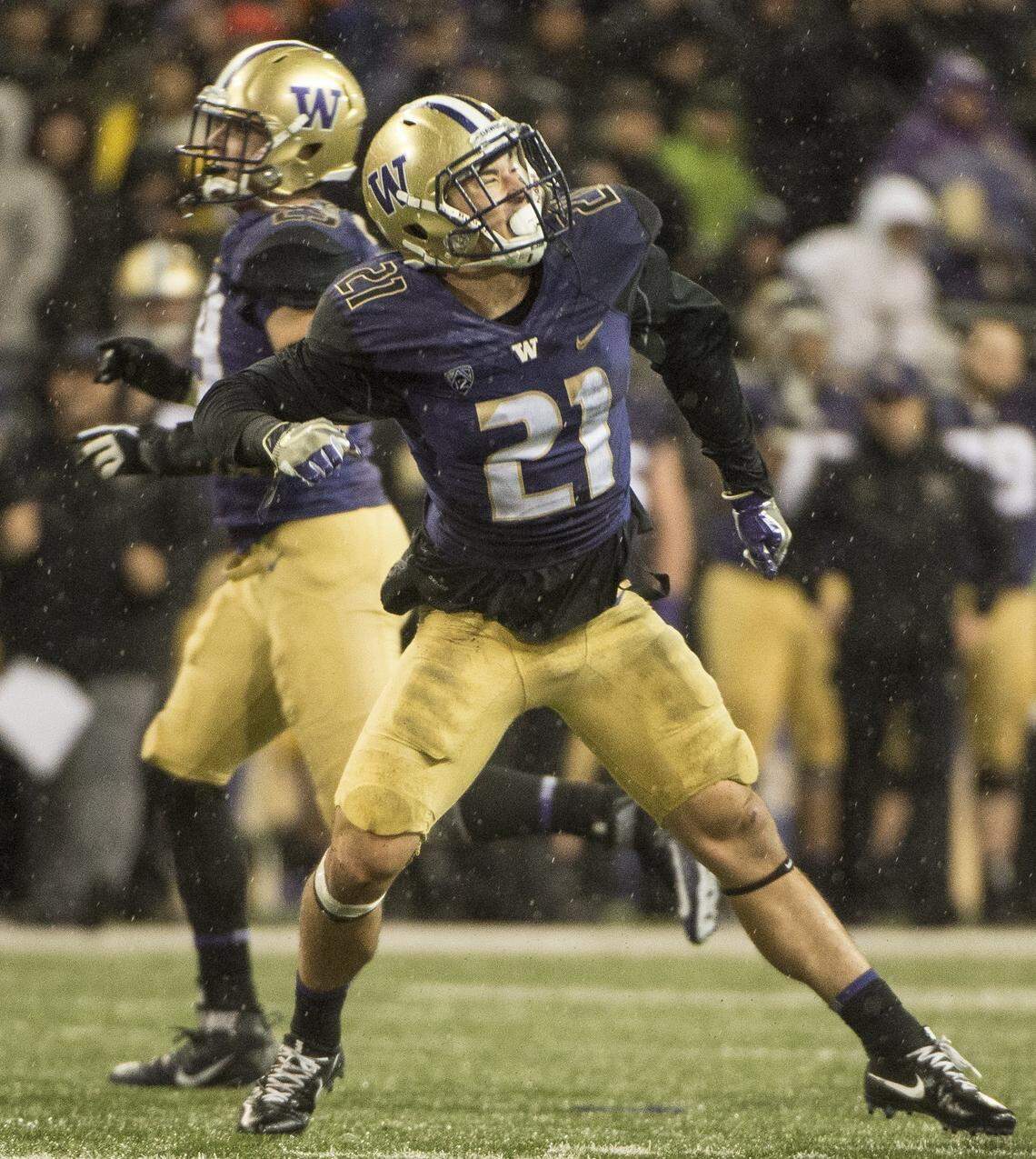 Washington defensive back Taylor Rapp celebrates a sack of Oregon quarterback Braxton Burmeister in a Nov. 4, 2017, game at Husky Stadium in Seattle, Wash. Rapp is expected to be taken early in the 2019 NFL Draft this weekend.