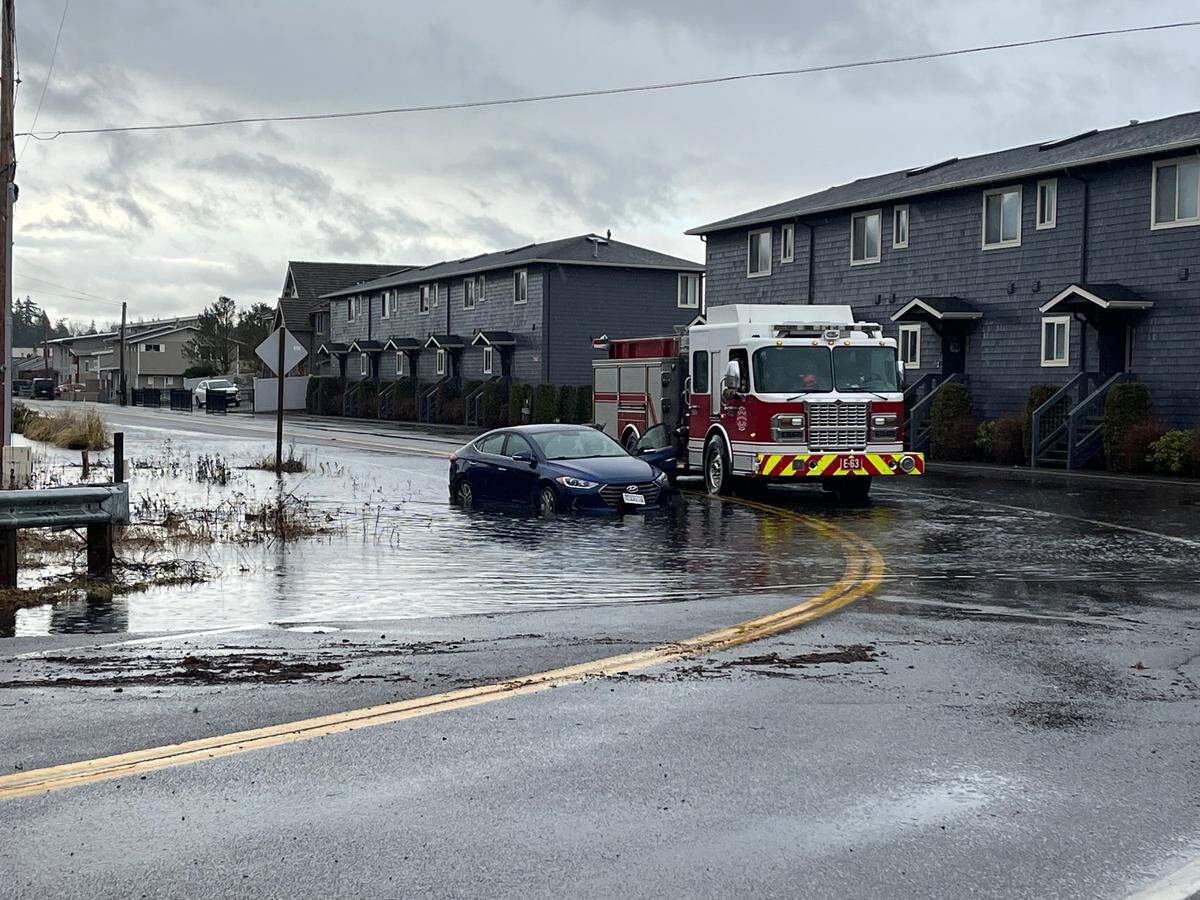 Flood waters cover the road at Birch Bay Drive/Anderson Road and Morrison Avenue Tuesday, Dec. 27, south of Blaine.