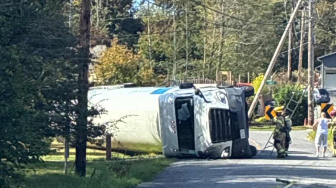 Police, HAZMAT teams respond to overturned tanker truck in Bellingham