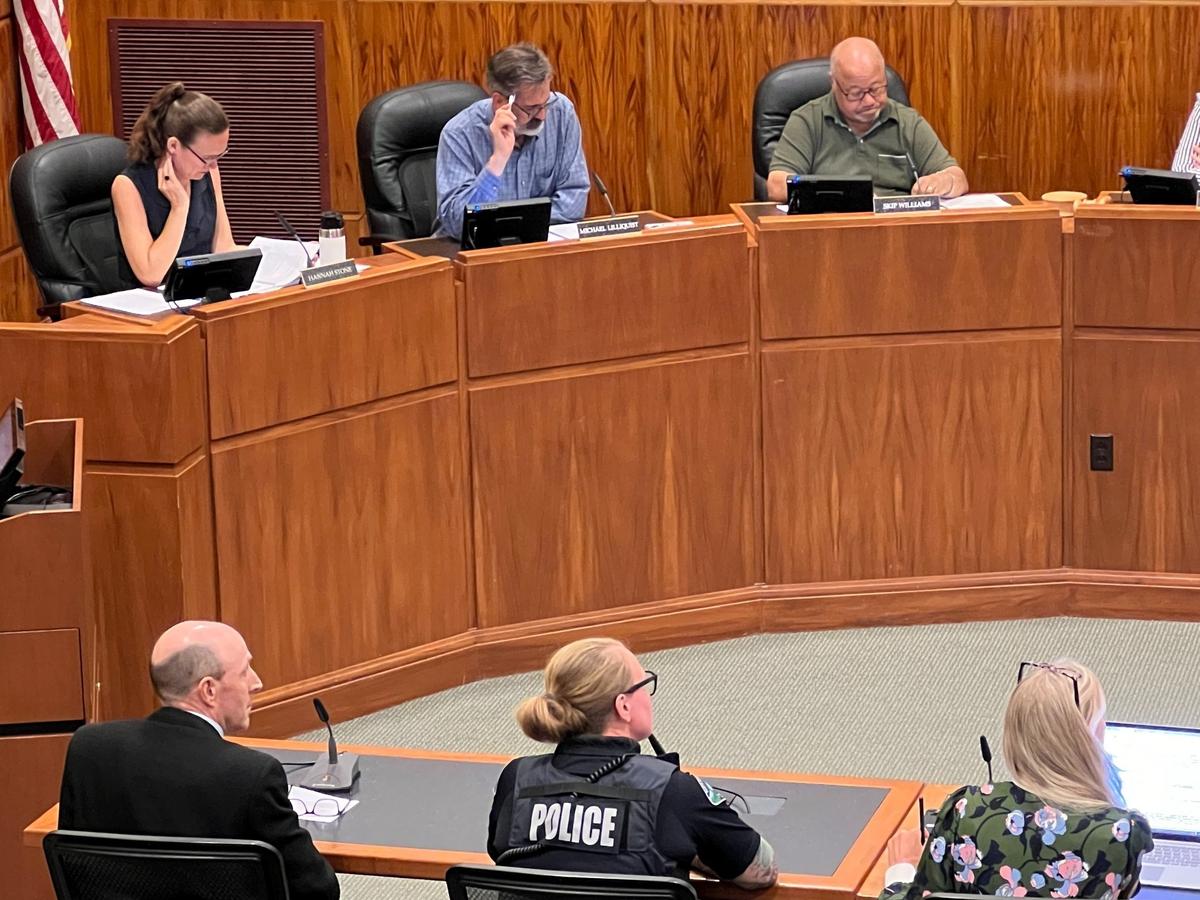 Whatcom County Prosecutor Eric Richey, left, addresses the Bellingham City Council’s Committee of the Whole on Monday, July 1, 2024, in Council Chambers at City Hall in Bellingham, Wash. Richey was discussing the Whatcom County Drug Task Force. To his left are Bellingham Police Chief Rebecca Mertzig and Mayor Kim Lund. At the council dias are councilmembers Hannah Stone, Michael Lilliquist and Skip Williams.