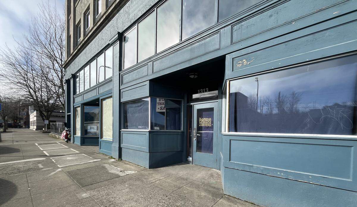Two storefronts, including the former location of Ramble Tamble, stood vacant along State Street in downtown Bellingham, Wash., on February 5. Windows were covered to prevent pedestrians from seeing inside.