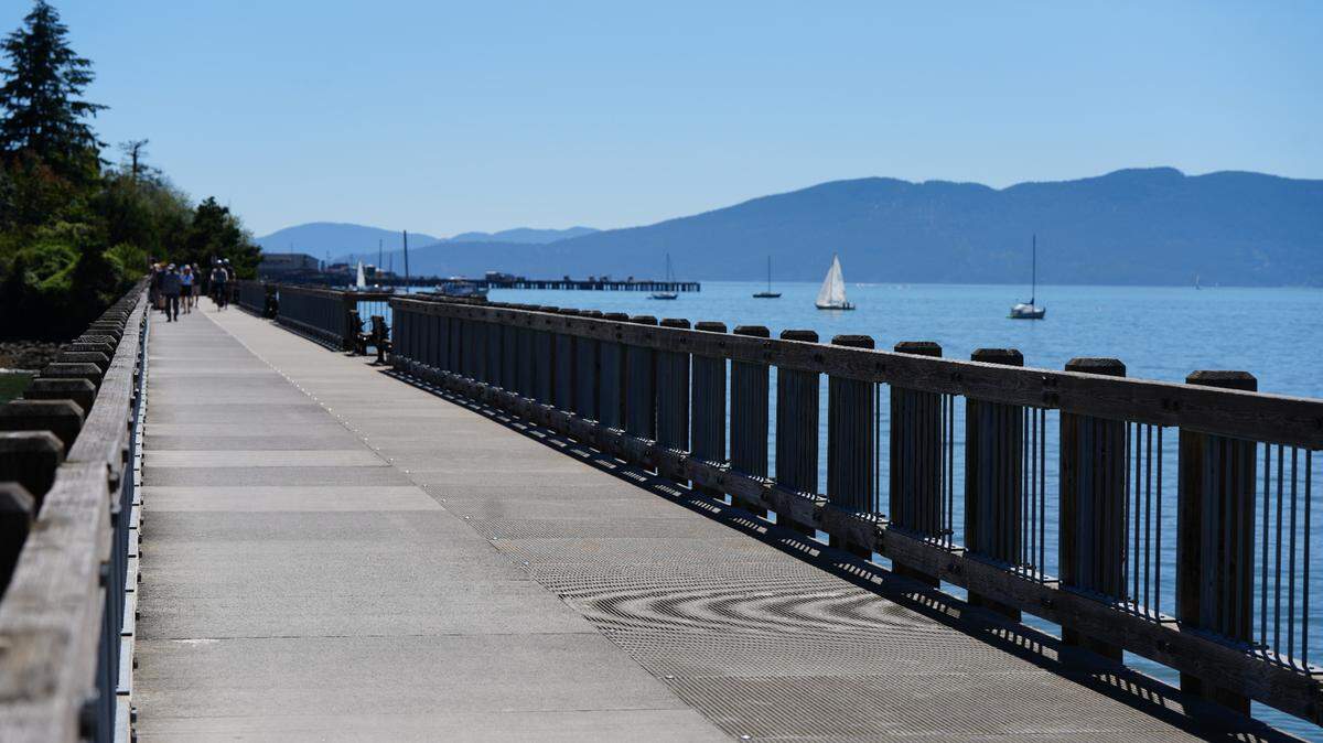 A walking path bridge extends between Boulevard Park and Taylor Dock in Bellingham, Wash.