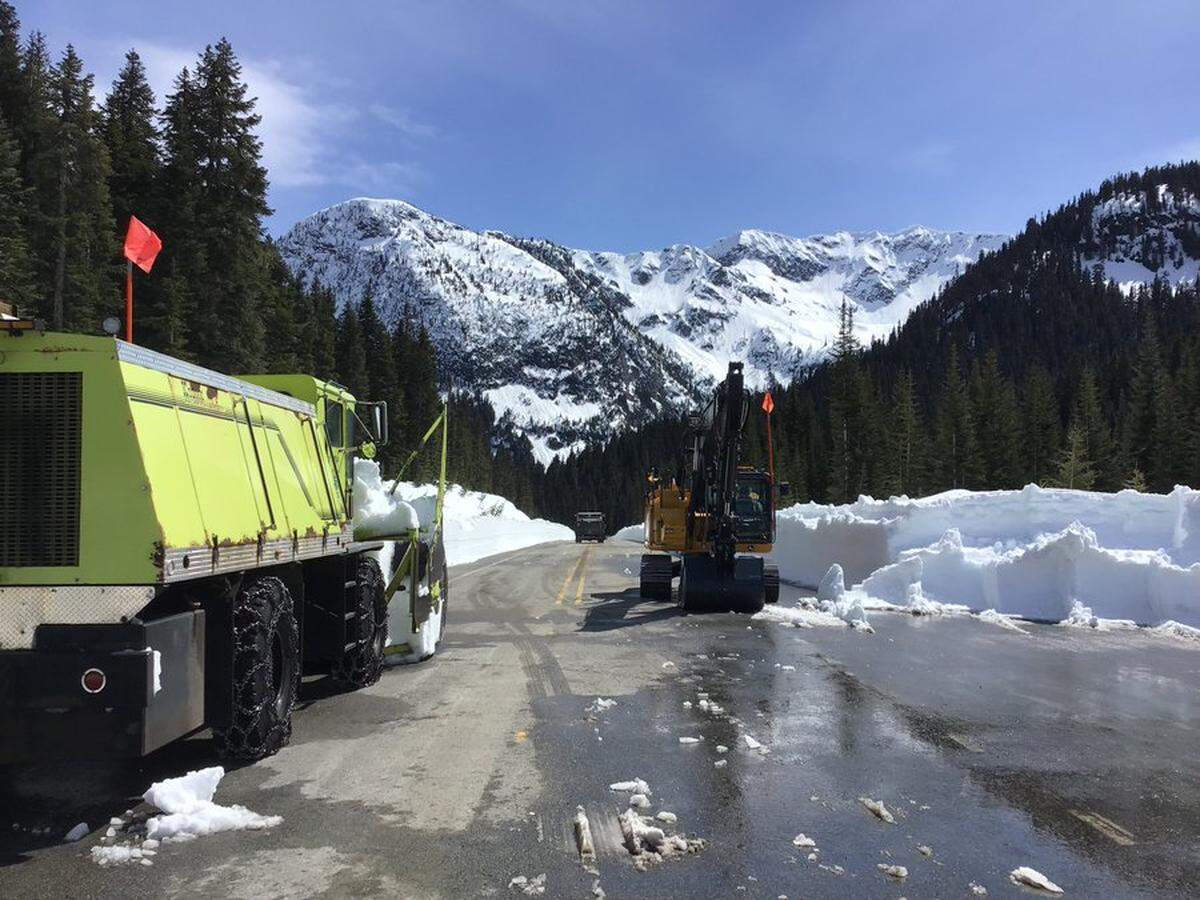 Washington State Department of Transportation crews clearing the North Cascades Highway from the east and west sides met at Rainy Pass on Friday, May 6, WSDOT said.