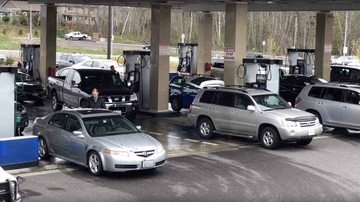 Patrons pump gas at Costco in Bellingham in this 2019 file photo