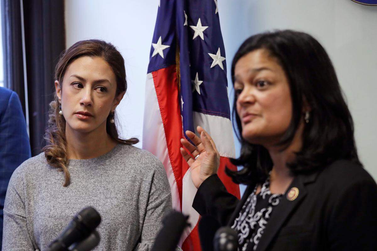 Negah Hekmati, left, looks on as Rep. Pramila Jayapal, D-Wash., addresses a news conference about Hekmati’s ordeal during an hours-long delay returning to the U.S. from Canada with her family days earlier, Monday in Seattle. Civil rights groups and lawmakers were demanding information from federal officials following reports that dozens of Iranian-Americans were held up and questioned at the border as they returned to the United States from Canada over the weekend. In a statement Sunday, the Washington state chapter of the Council on American-Islamic Relations said more than 60 Iranians and Iranian-Americans were detained and questioned at the Peace Arch Border Crossing in Blaine.
