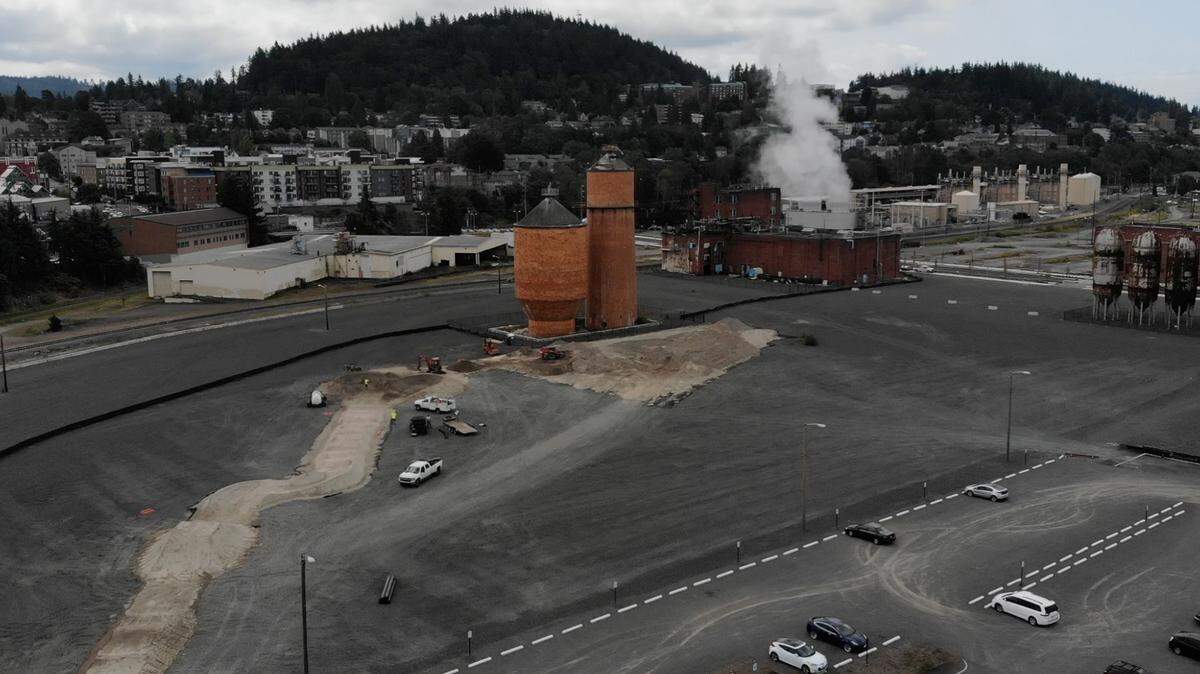 construction beings on a bike pump track on the former Georgia-Pacific site on the waterfront in Bellingham. The track, set to be near the two orange-tiled tanks, is expected to open by mid-September 2019. It is part of an overall temporary mountain bike park.