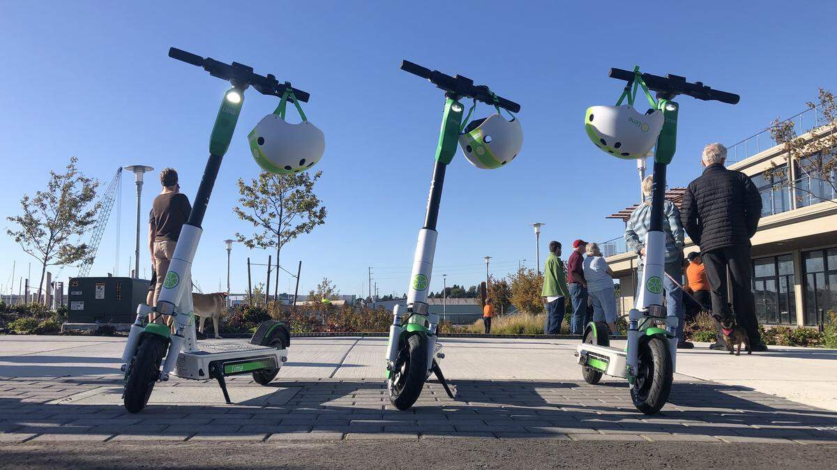 E-scooters sit on display during an event held by the Downtown Bellingham Partnership at Waypoint Park in Bellingham Sept. 26.