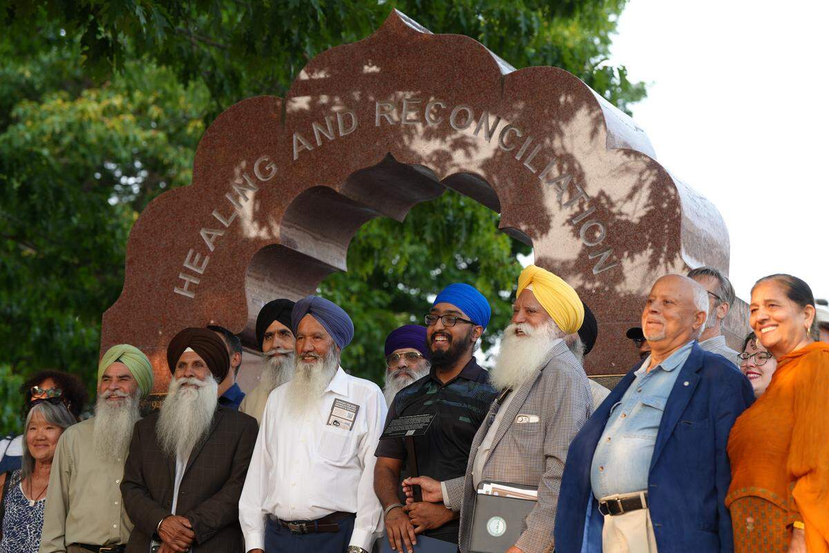 Whatcom County Executive Satpal Sidhu gathered alongside community members at the Arch of Healing and Reconciliation on Sept. 4 in Bellingham to mark the anniversary of the Bellingham Riot of 1907, which violently forced hundreds of Punjabi Sikh mill workers out of town.