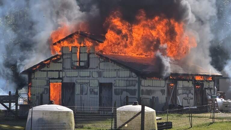 Fire at Whatcom County farm destroys barn; charging battery suspected as cause