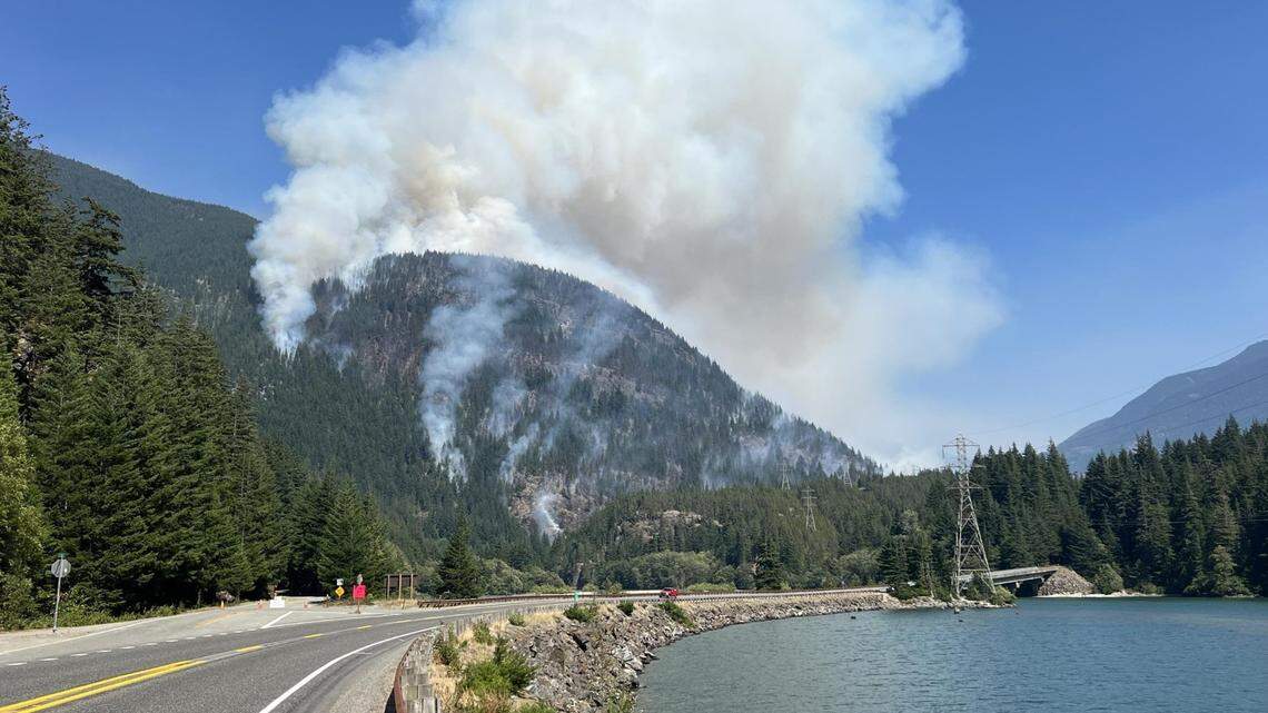 A photo taken near Diablo on Friday shows a smoke column rising high into the sky.