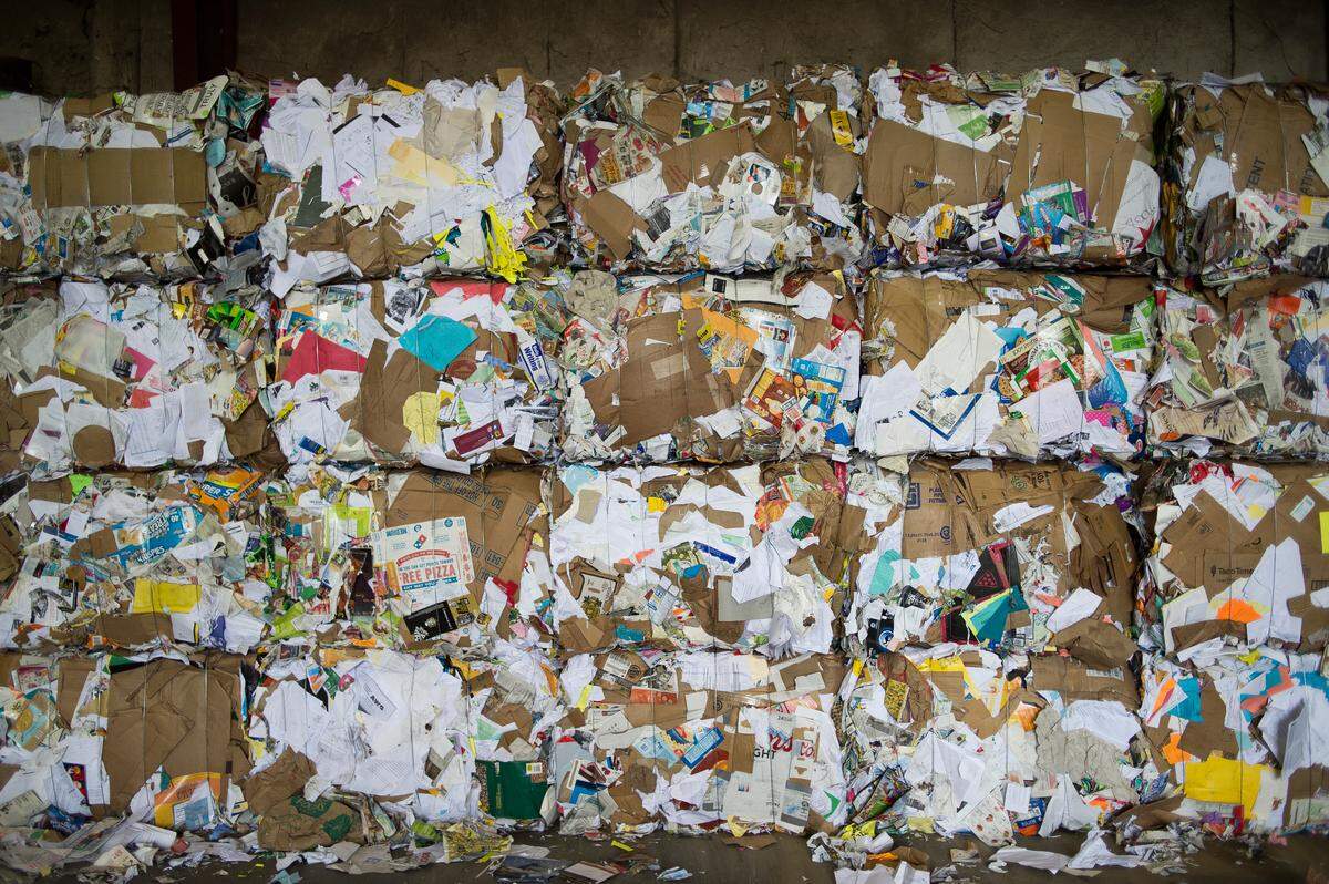 Stacks of paper bales sit along a wall at Northwest Recycling, Inc. in Bellingham. Each bale weighs about 1,300 pounds.