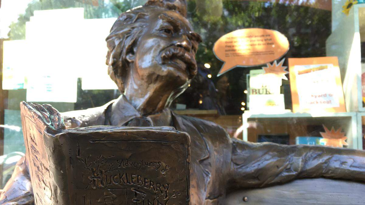 A sculpture of celebrated American writer Mark Twain outside of Village Books in Fairhaven.