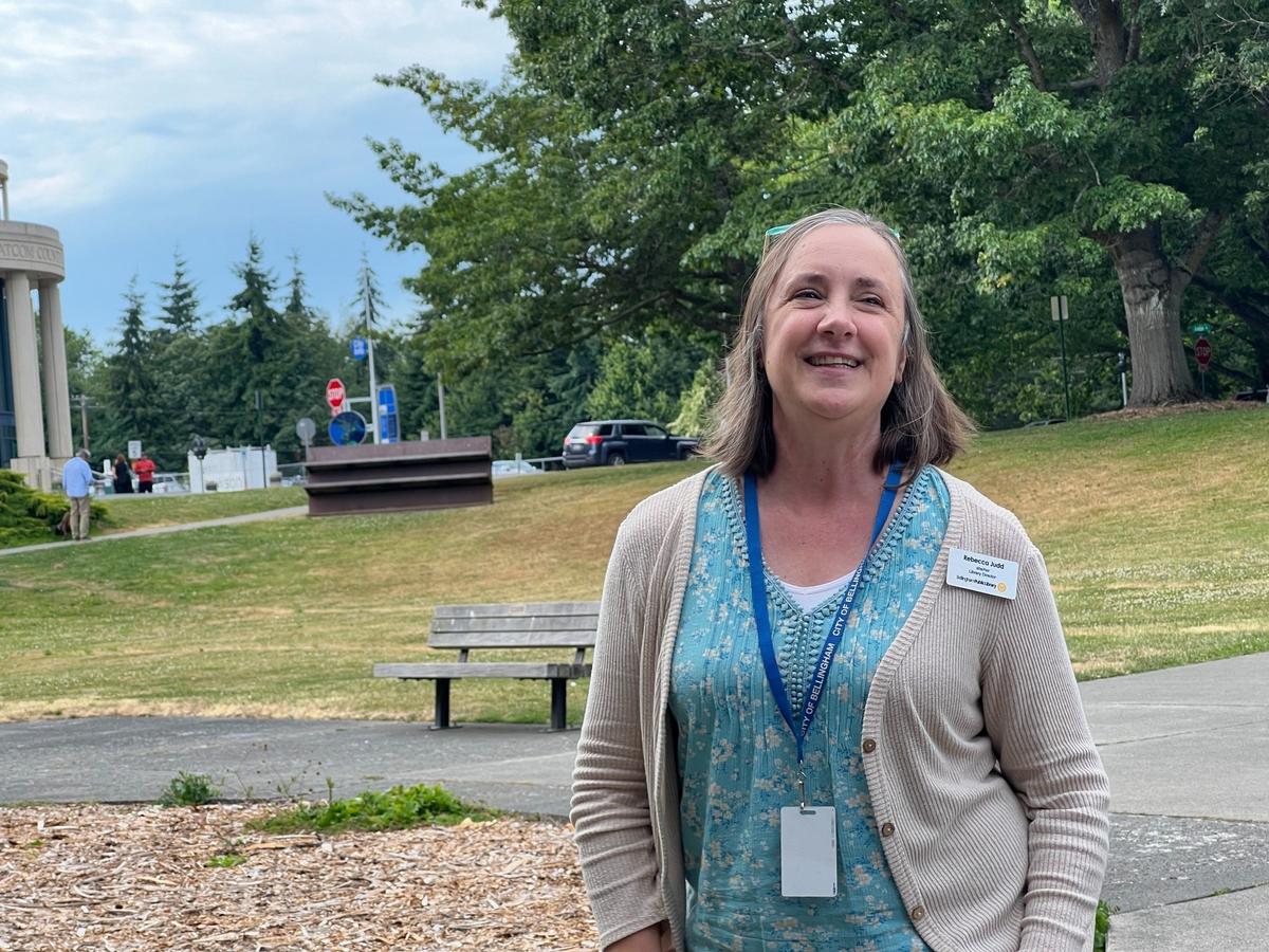 Bellingham Public Library Executive Director Rebecca Judd stands outside the downtown branch’s lower level in 2024.