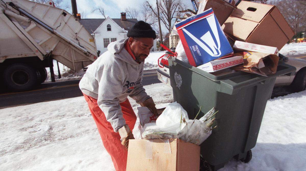 Trash piles up in Raleigh, N.C., in 2009 as snow left garbage crews behind in picking up trash.