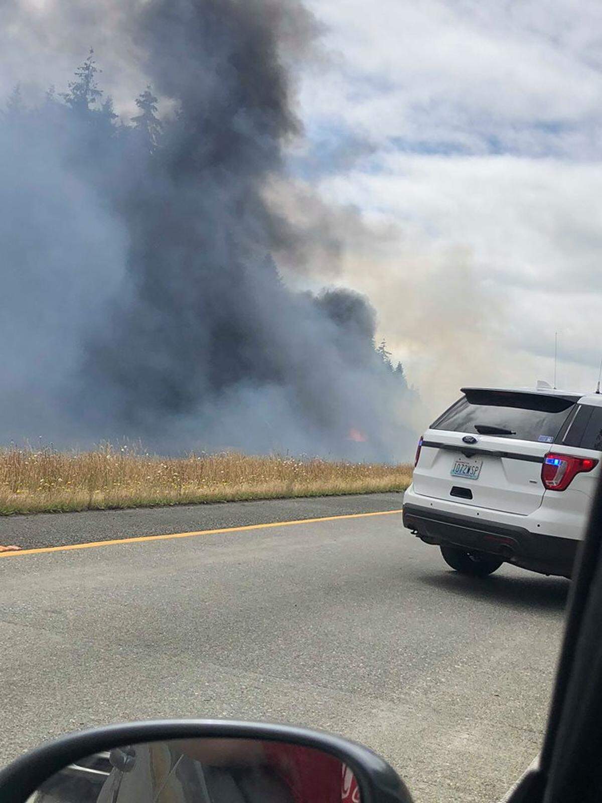 An RV fire has stopped traffic on both southbound lanes of Interstate 5 near Bow Hill Road.