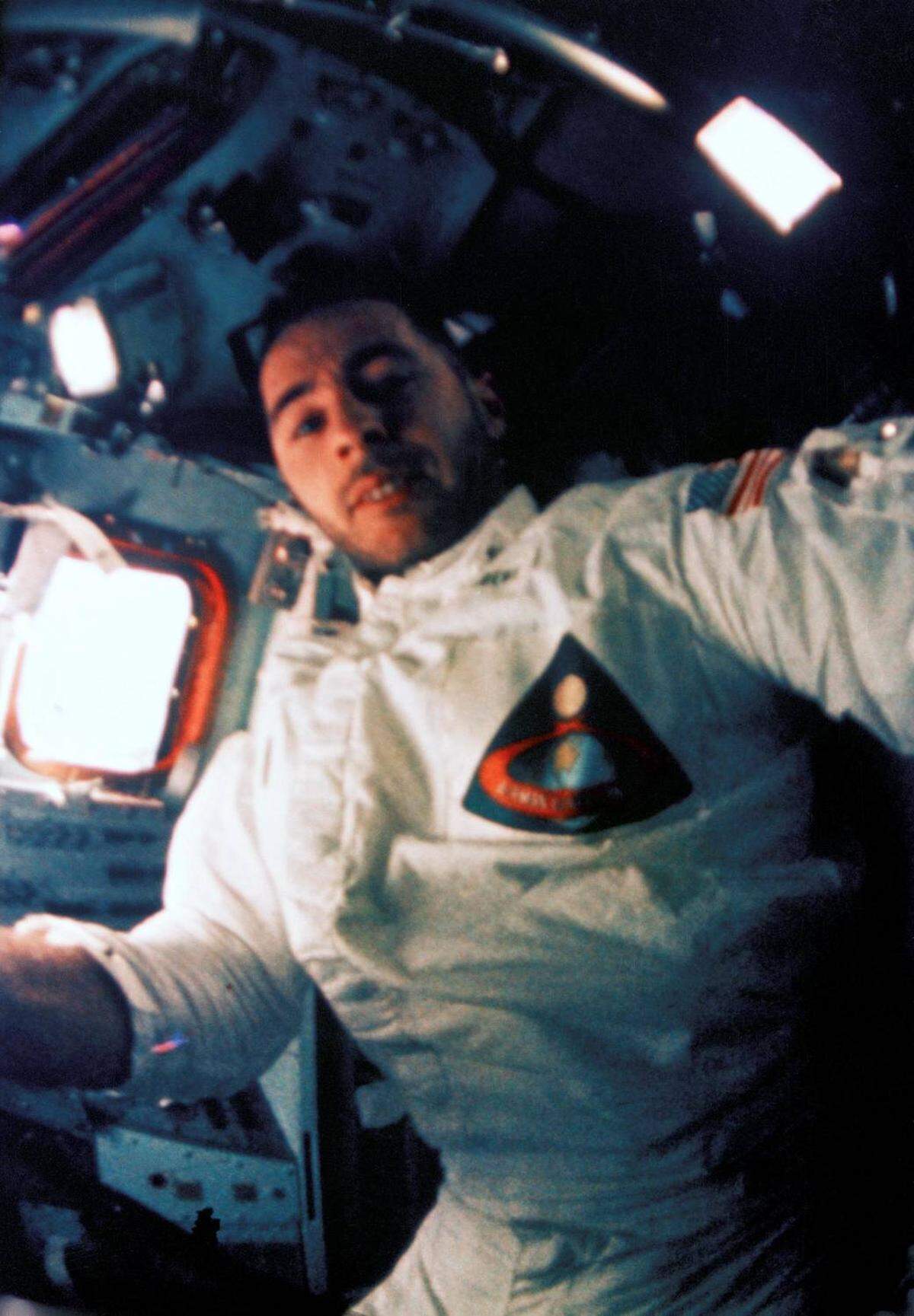 Astronaut William A. Anders, who was the lunar module pilot for the Apollo 8 mission, is shown inside the spacecraft during lunar orbit in December 1968.