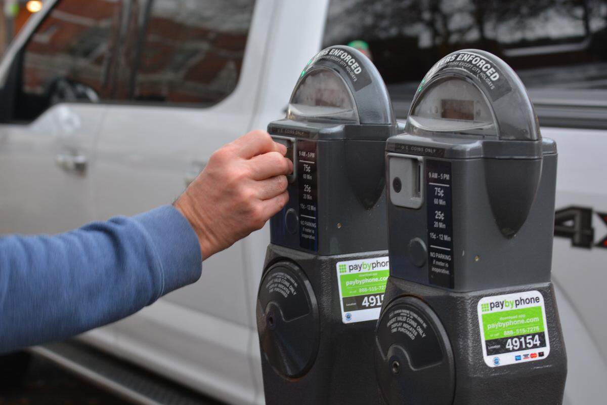 Meters in downtown Bellingham accept payment via both coins and a smartphone parking app.