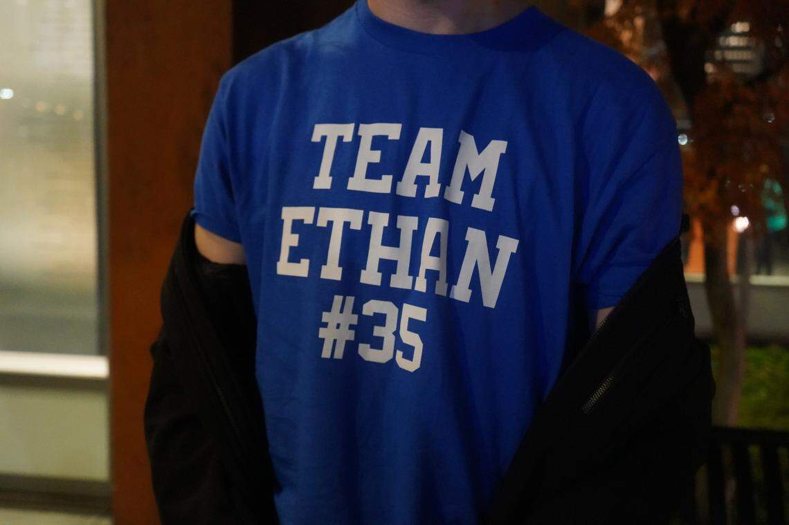 Ryan Chonka, a friend of Ethan Chapin’s from middle school and high school, wore a blue “Team Ethan” shirt to Chapin’s memorial Monday night, Nov. 21, at Skagit Valley Community College Monday in Mount Vernon, Wash. Chapin was one of four University of Idaho students stabbed to death Nov. 13, in Moscow, Idaho.